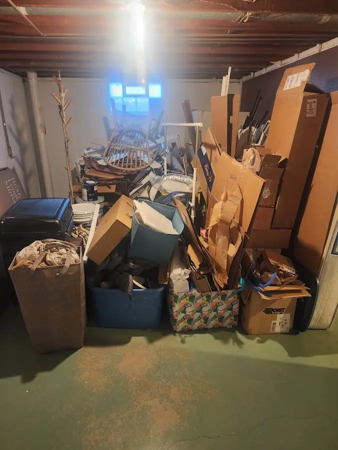 Roll-off dumpster container at job site for Yard Waste Dumpster Rental in Notre Dame